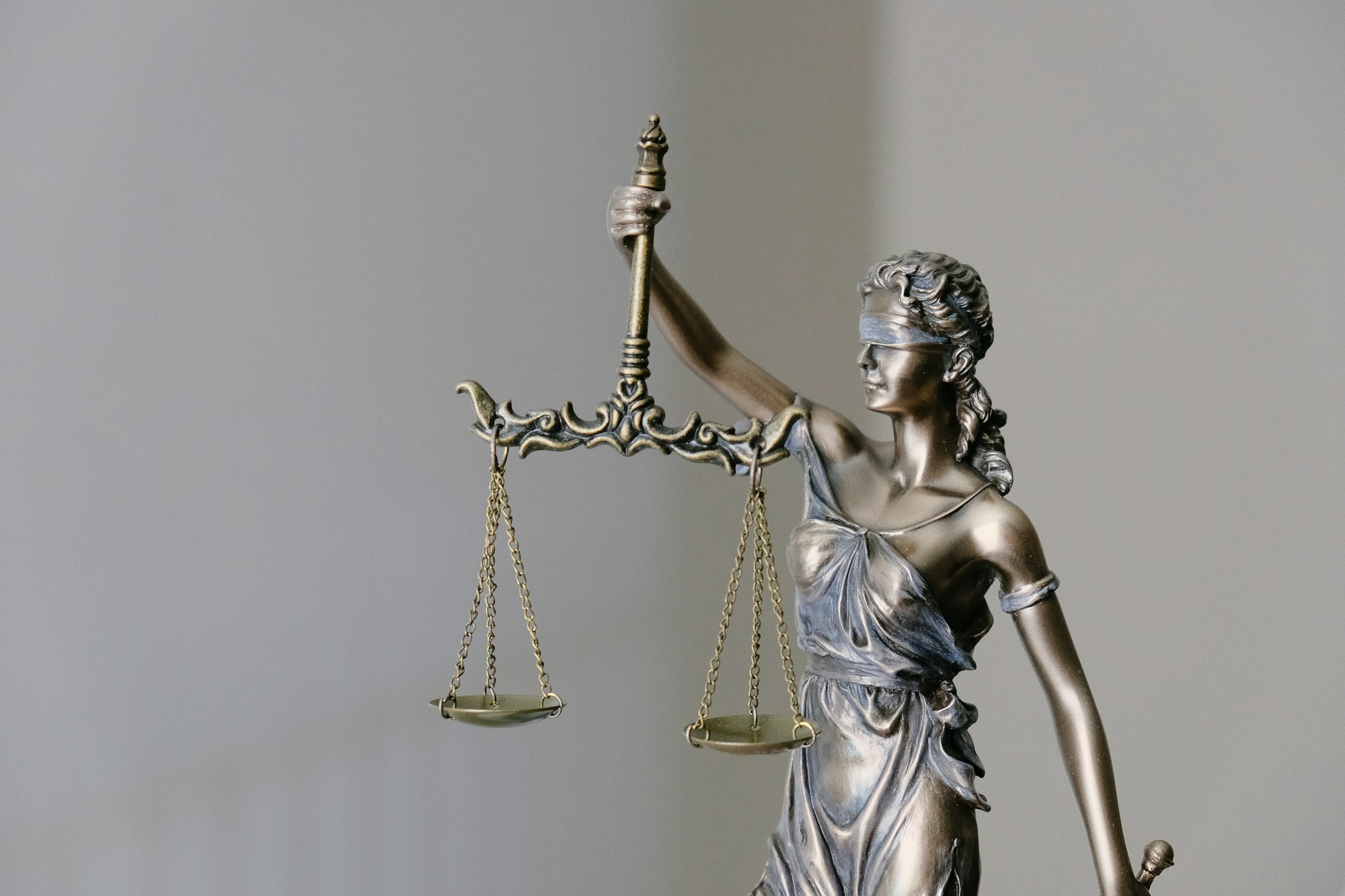 Statue of Lady Justice — a visual stand-in for the regulated environments CBR Labs serves.